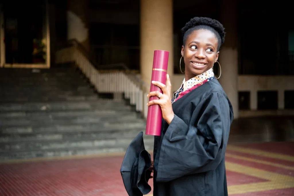 young-lady-holding-a-certificate Nigerian degree recognition in Canada USA UK